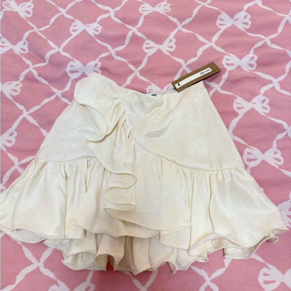 crème colored ruffle skirt